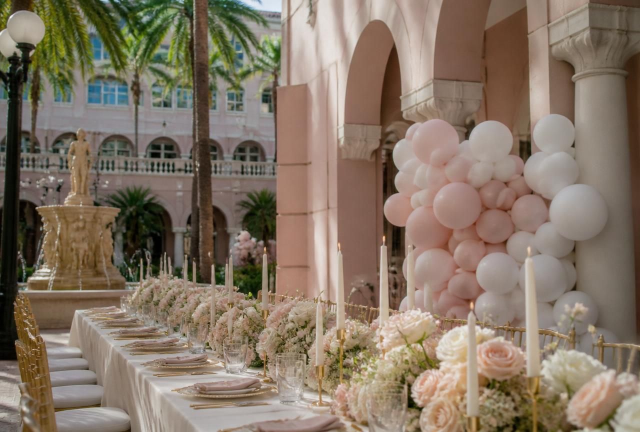 Balloon Backdrops setup in Boca Raton — Mizner Park Mediterranean arches